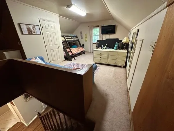 a bed room with furniture and a couch
