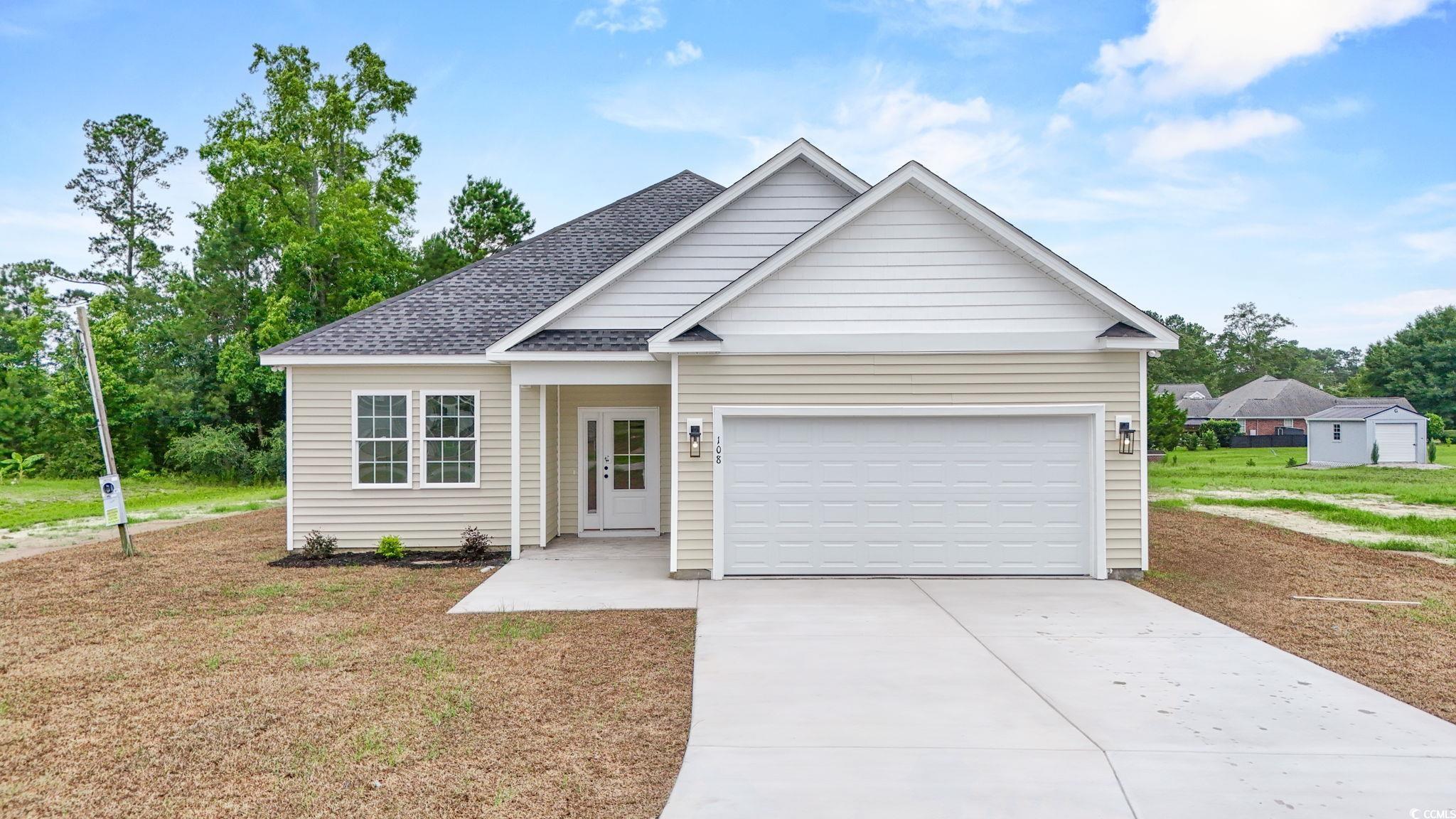 108 Infinity Lane Loris, SC 29569 - Photo 1 of 35 View of front facade featuring concrete driveway,