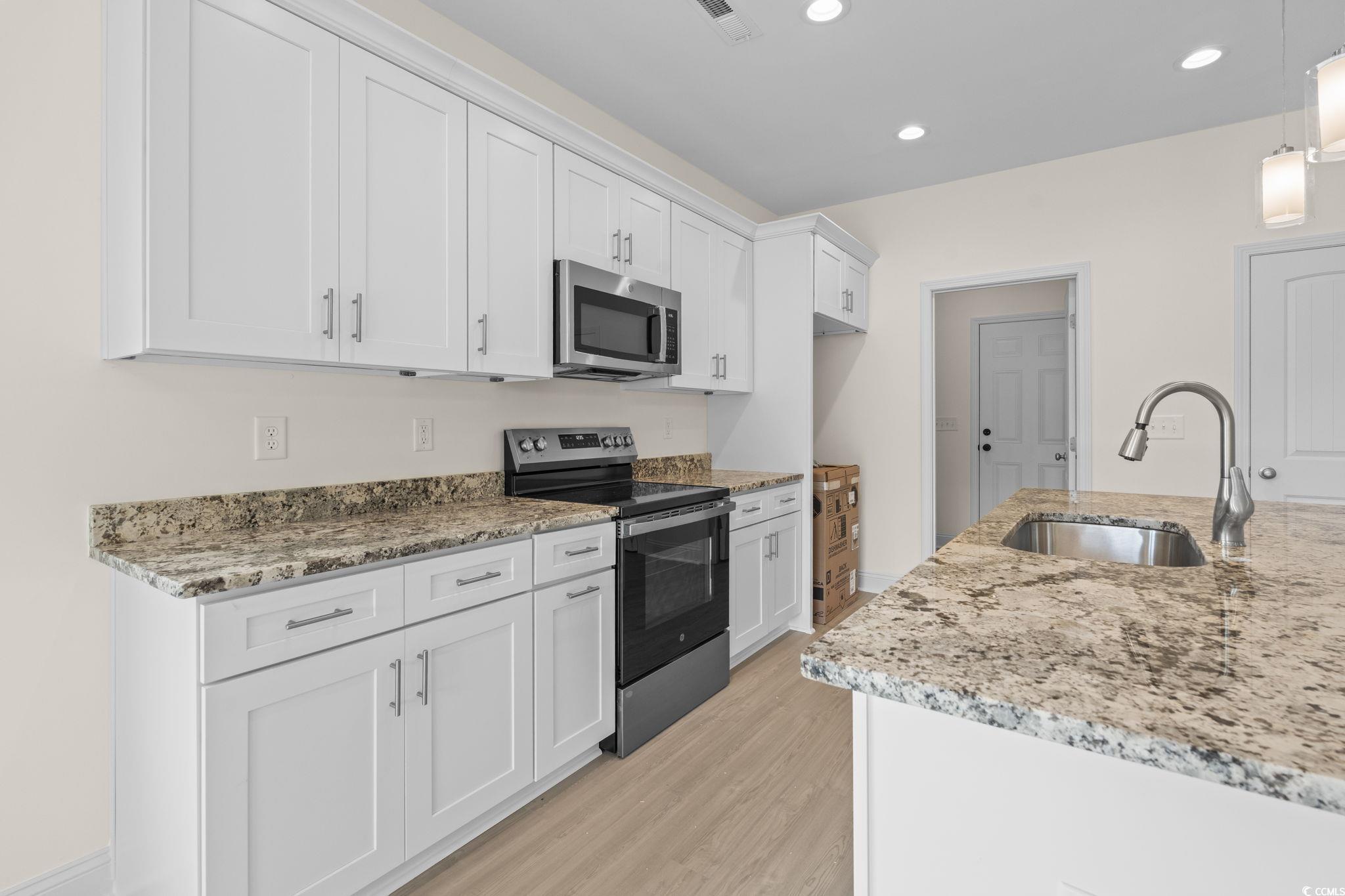 108 Infinity Lane Loris, SC 29569 - Photo 15 of 35 Kitchen featuring stainless steel appliances, whit