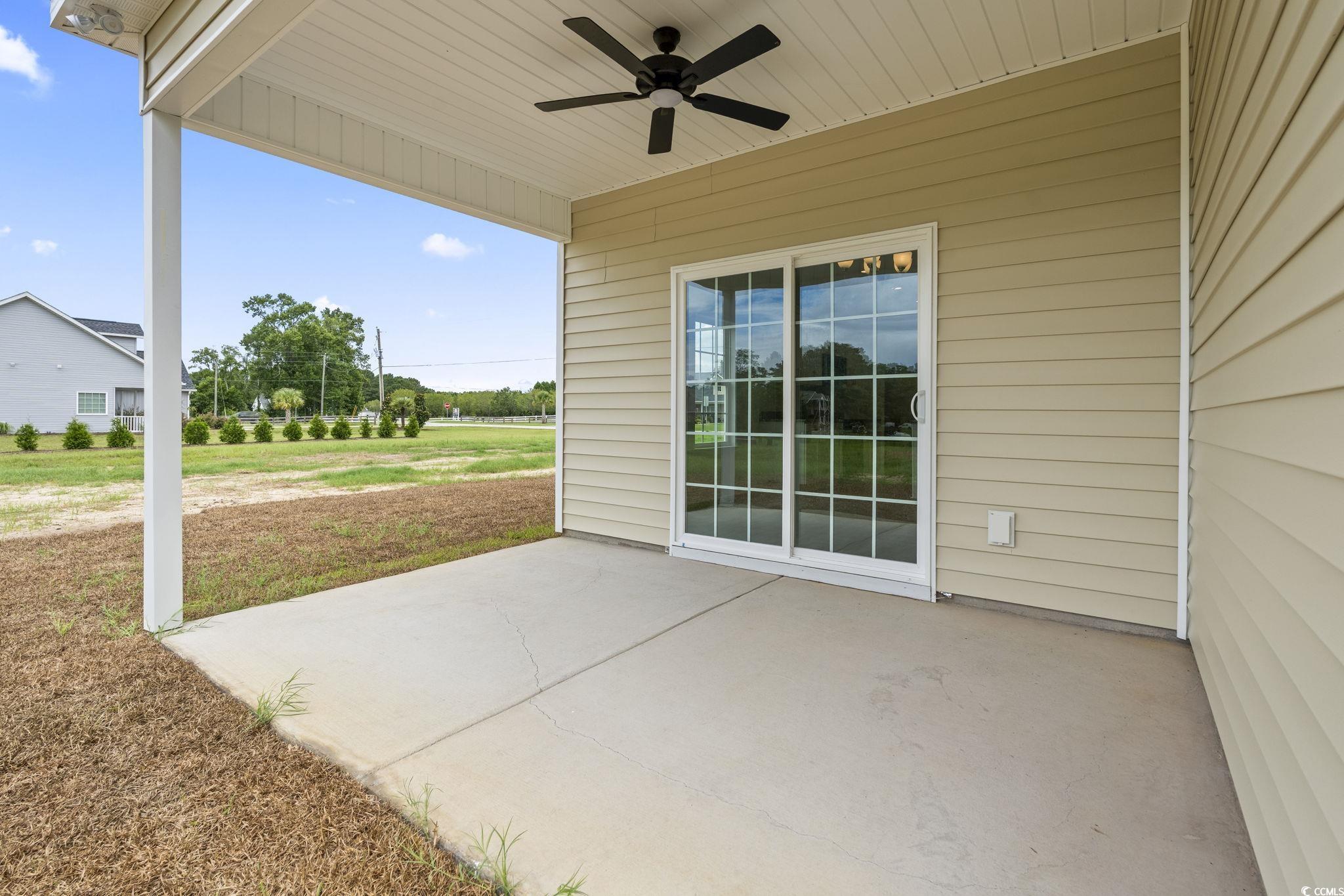 108 Infinity Lane Loris, SC 29569 - Photo 29 of 35 View of patio / terrace with ceiling fan