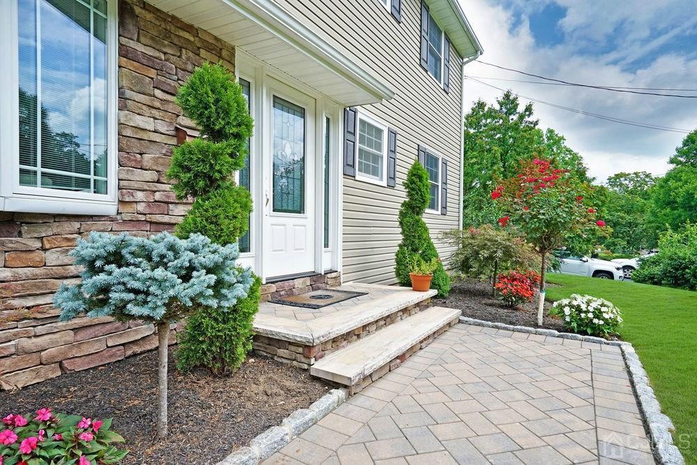5 Donald Road East Brunswick, NJ 08816 - Photo 8 of 49 a view of garden with patio