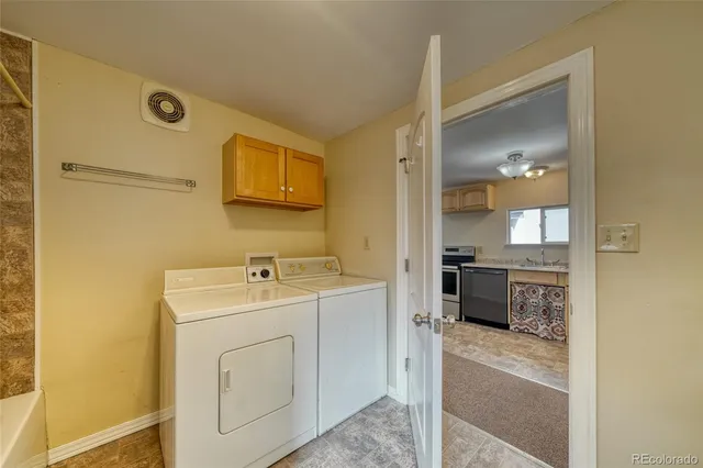 a bathroom with a sink toilet and mirror