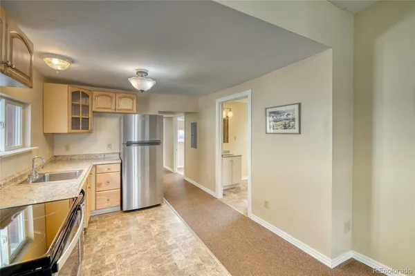 a view of a kitchen with a sink