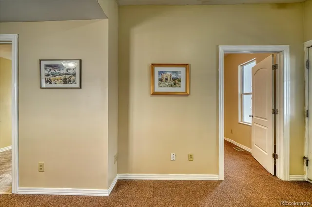 a view of a hallway with closet