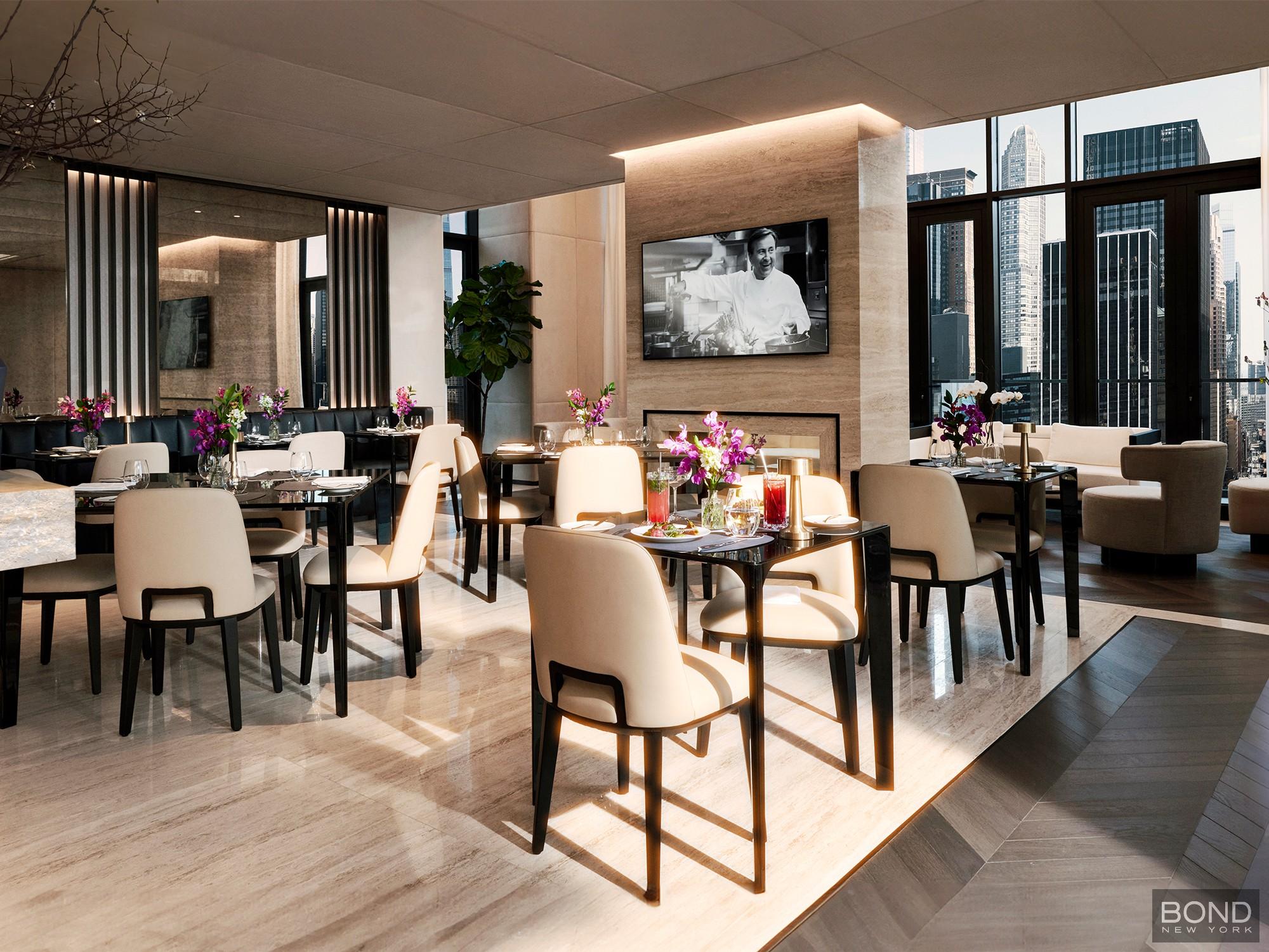 685 5th Avenue, Unit 9A Manhattan, NY 10022 - Photo 10 of 20 a view of a dining room with furniture window and outdoor kitchen