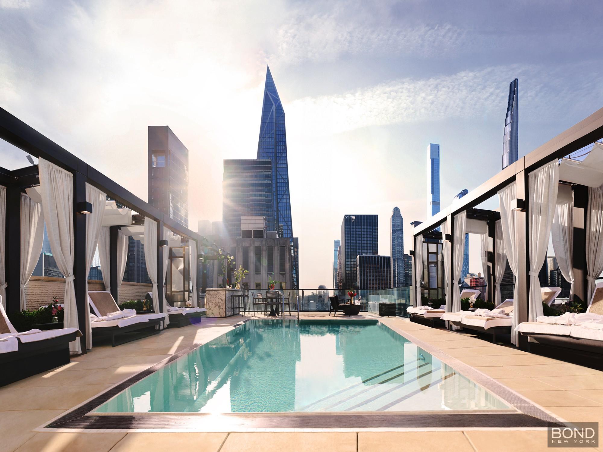 685 5th Avenue, Unit 9A Manhattan, NY 10022 - Photo 13 of 20 a view of swimming pool with outdoor seating