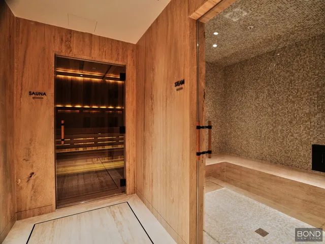 a living room with furniture and cars