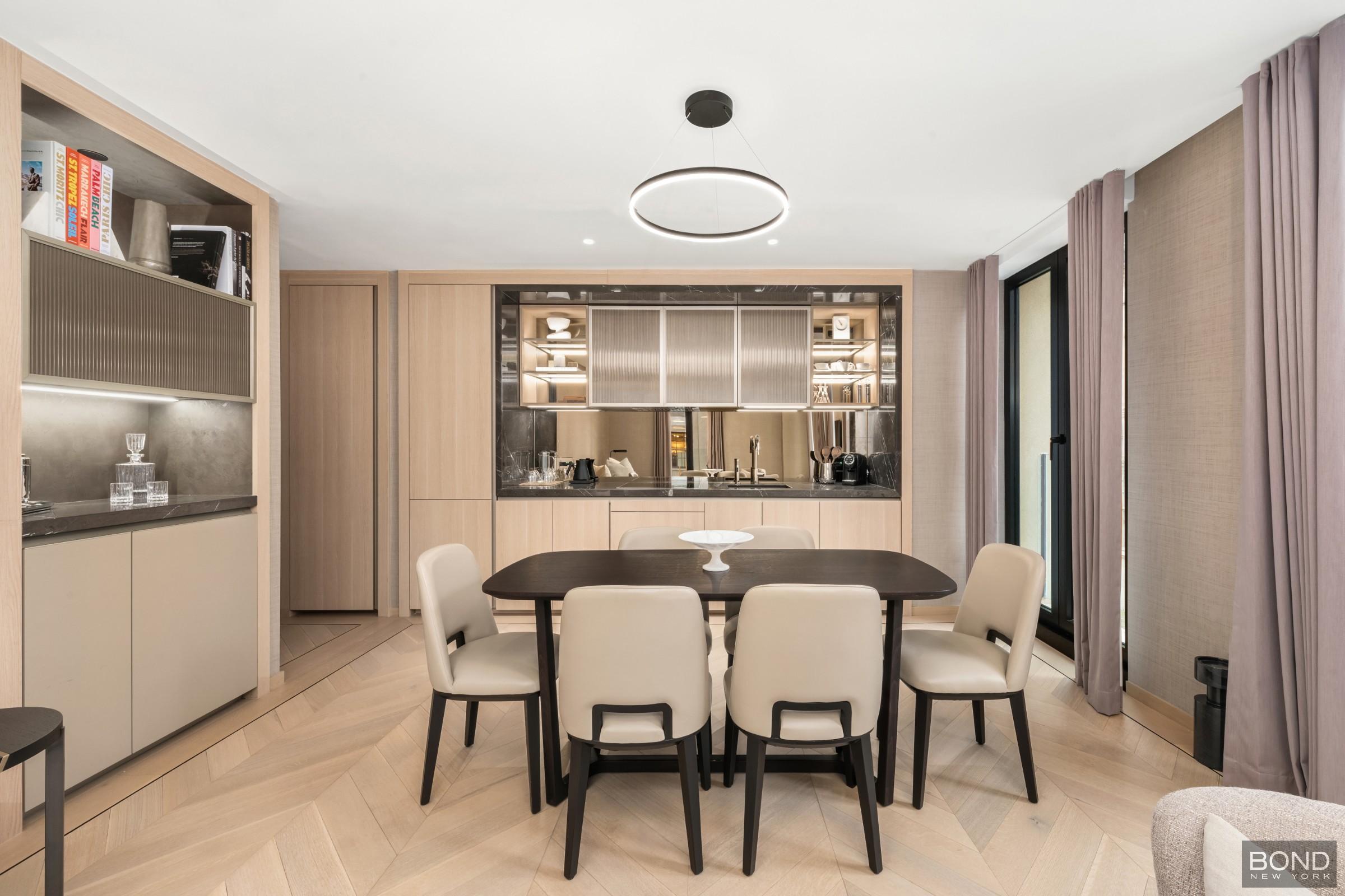 685 5th Avenue, Unit 9A Manhattan, NY 10022 - Photo 2 of 20 a dining room with furniture and window