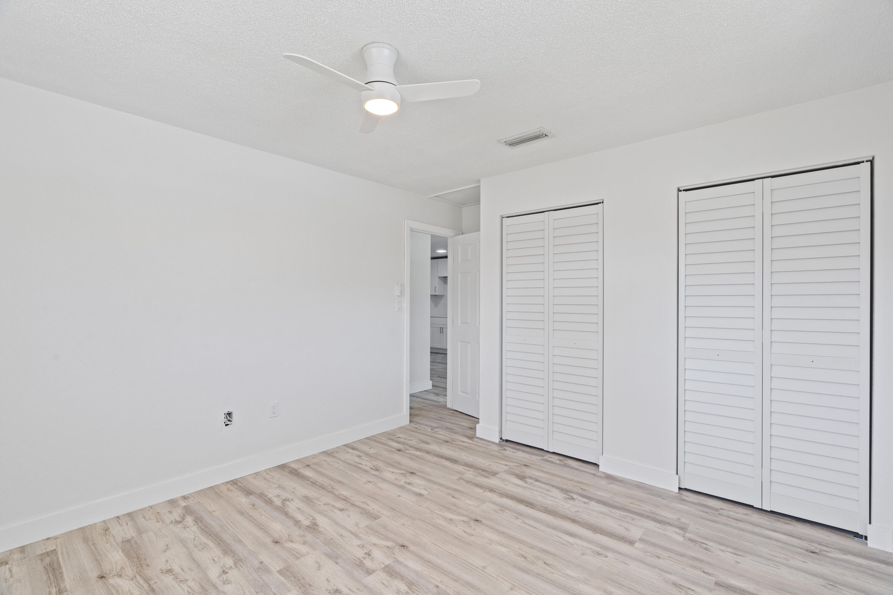 662 Granada Street Fort Pierce, FL 34949 - Photo 17 of 48 wooden floor in an empty room