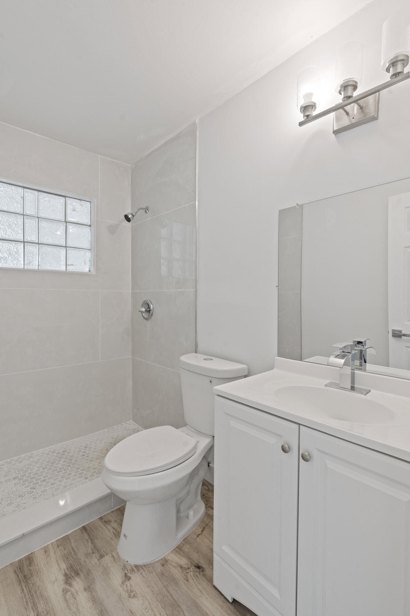 662 Granada Street Fort Pierce, FL 34949 - Photo 20 of 48 a bathroom with a sink a toilet and shower