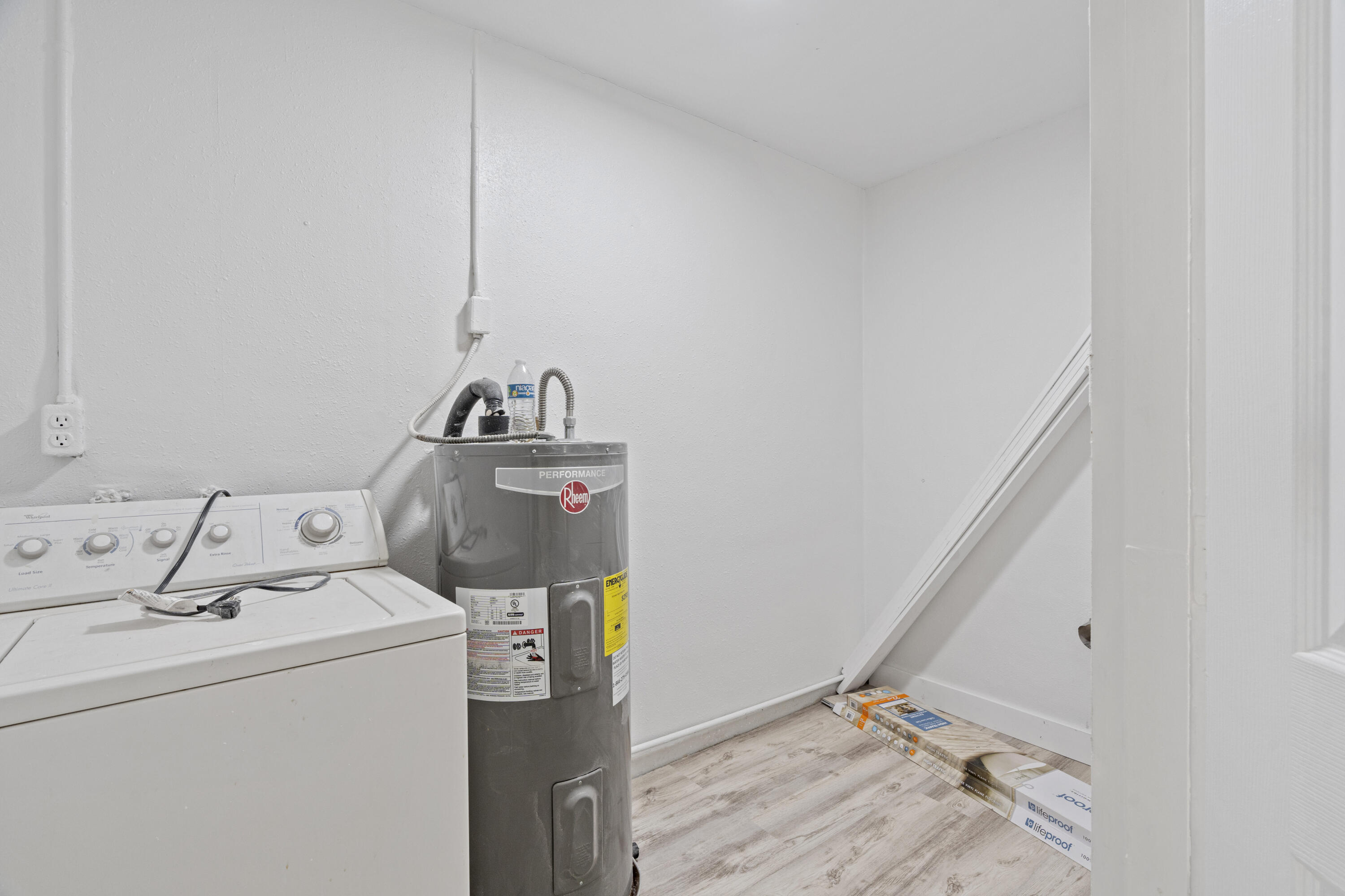 662 Granada Street Fort Pierce, FL 34949 - Photo 35 of 48 a utility room with dryer and washer