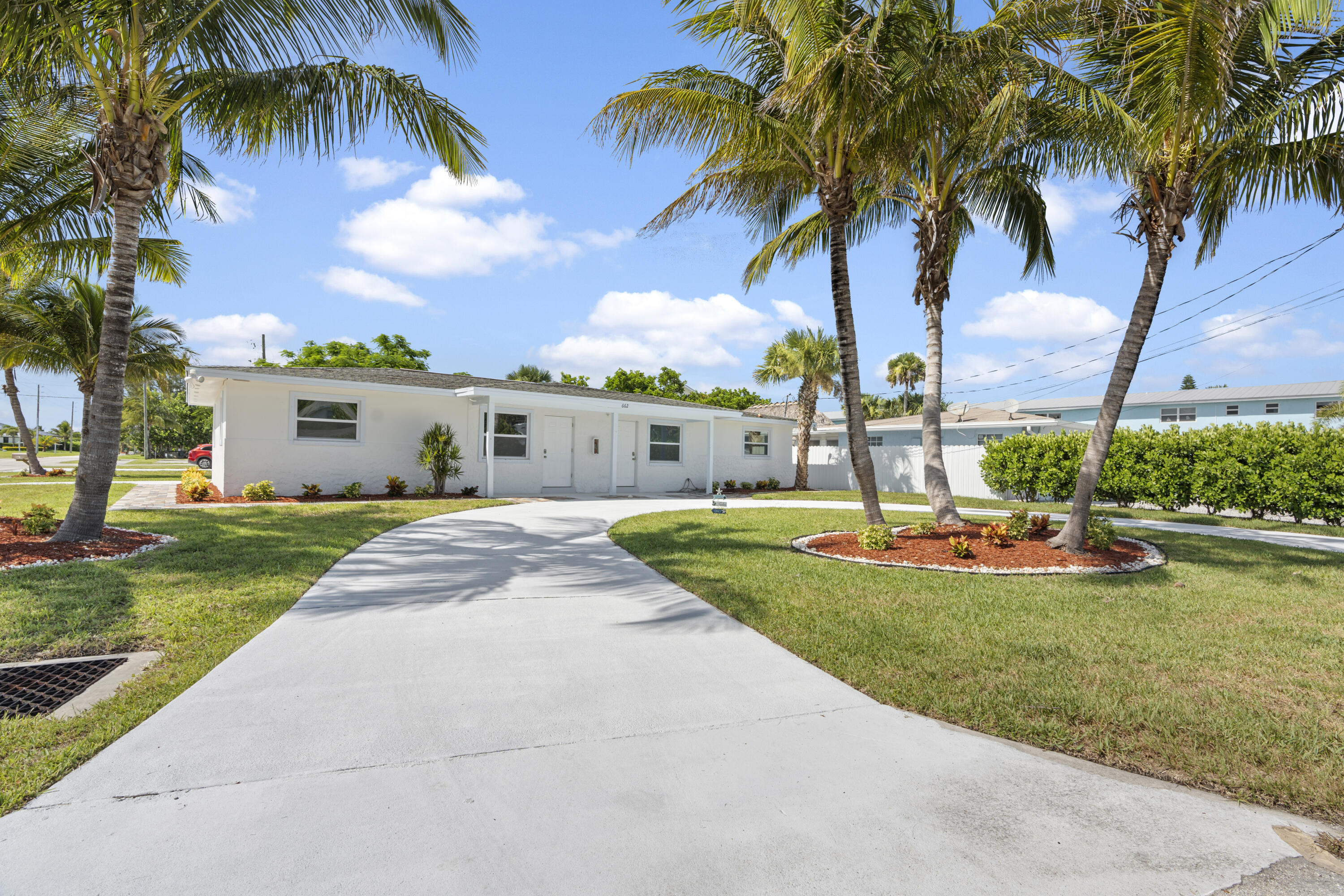 662 Granada Street Fort Pierce, FL 34949 - Photo 10 of 48 a front view of house with yard and swimming pool