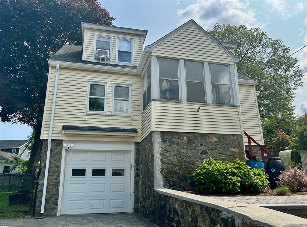 20 Oak Road Medford, MA 02155 - Photo 1 of 1 a front view of a house with a yard