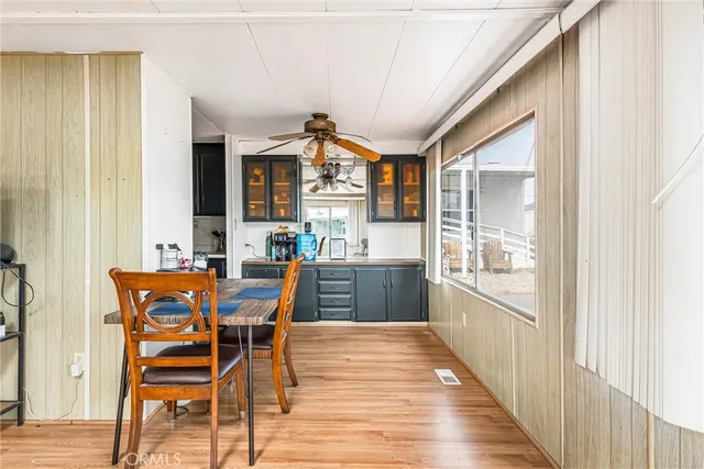 a kitchen with sink cabinets and microwave