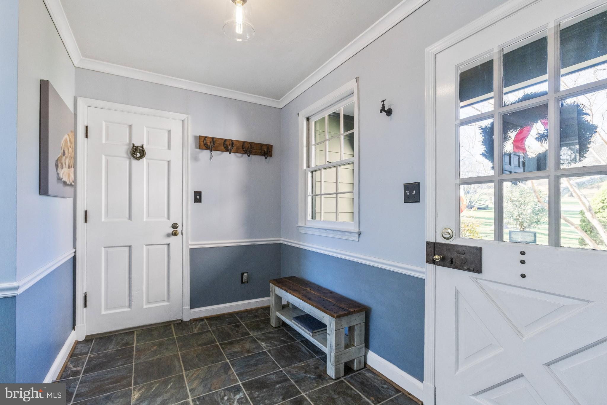 1918 Merrifields Drive Silver Spring, MD 20906 - Photo 22 of 56 Mud room showing door to garage and front