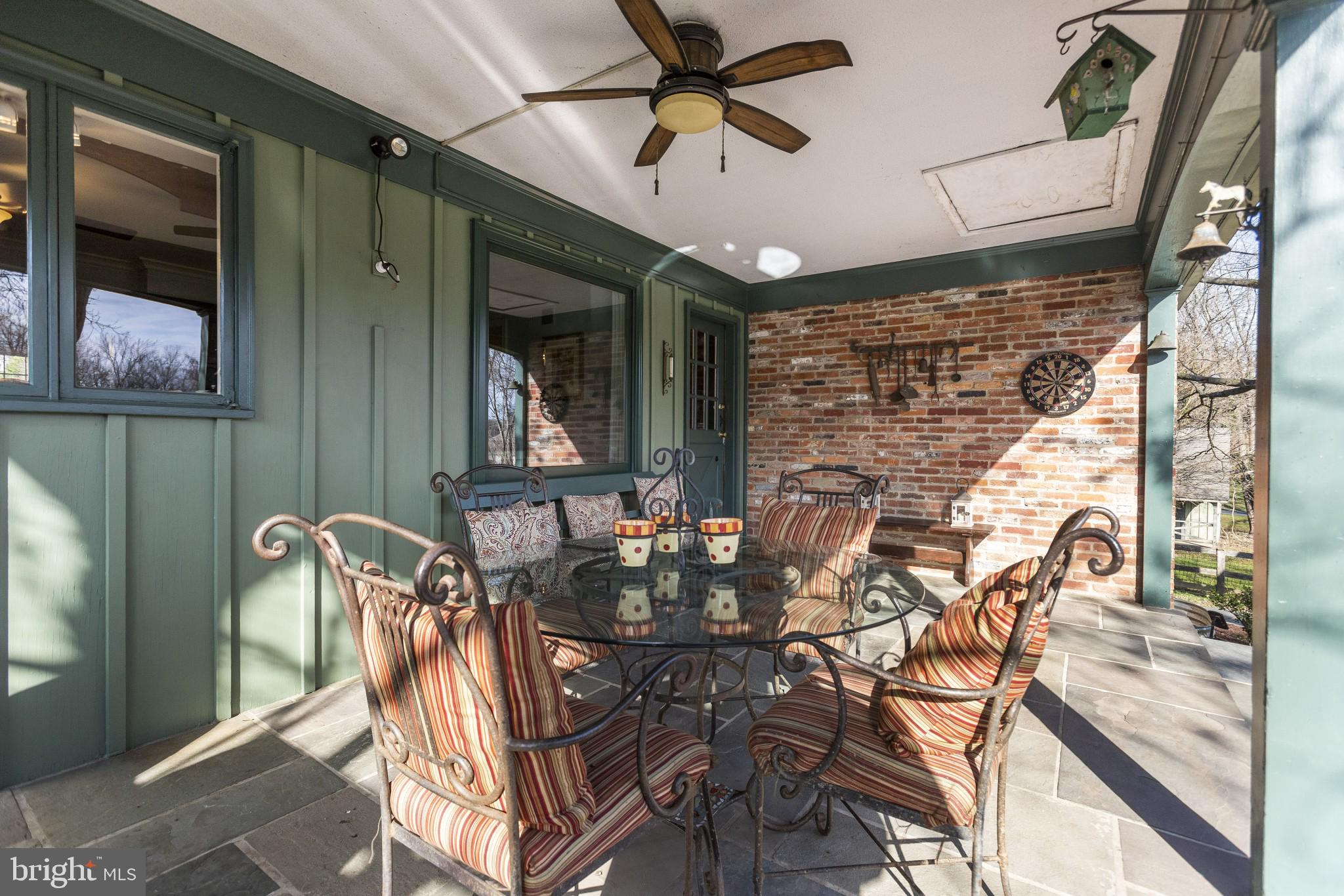 1918 Merrifields Drive Silver Spring, MD 20906 - Photo 25 of 56 Covered patio toward door to kitchen and family rm