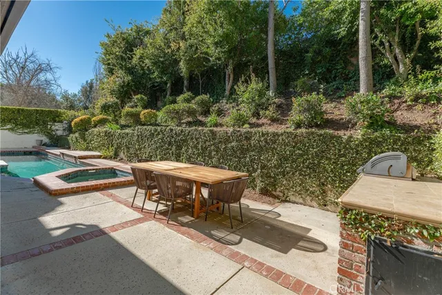 a view of a yard with furniture