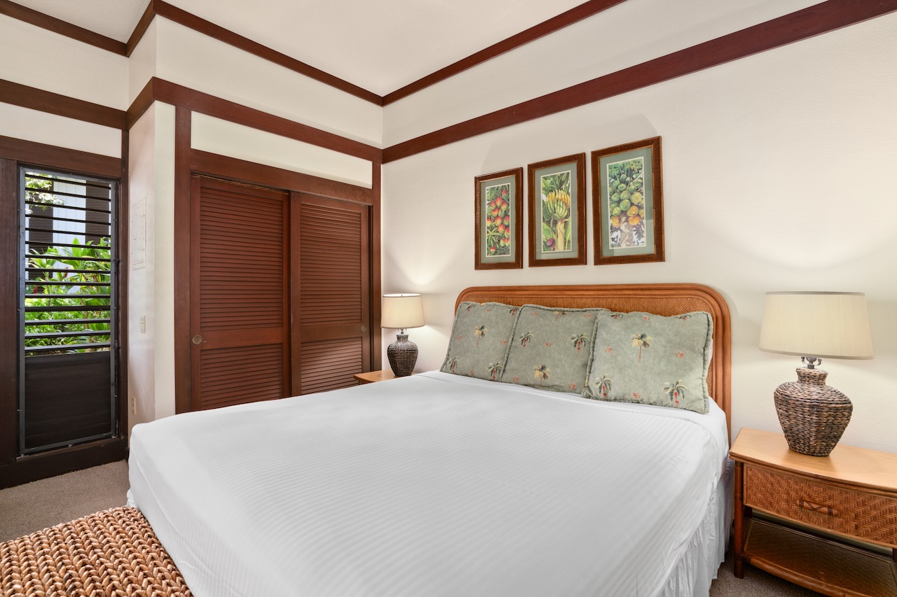 2253 Poipu Road, Unit 192 Koloa, HI 96756 - Photo 20 of 27 a bedroom with a bed and window