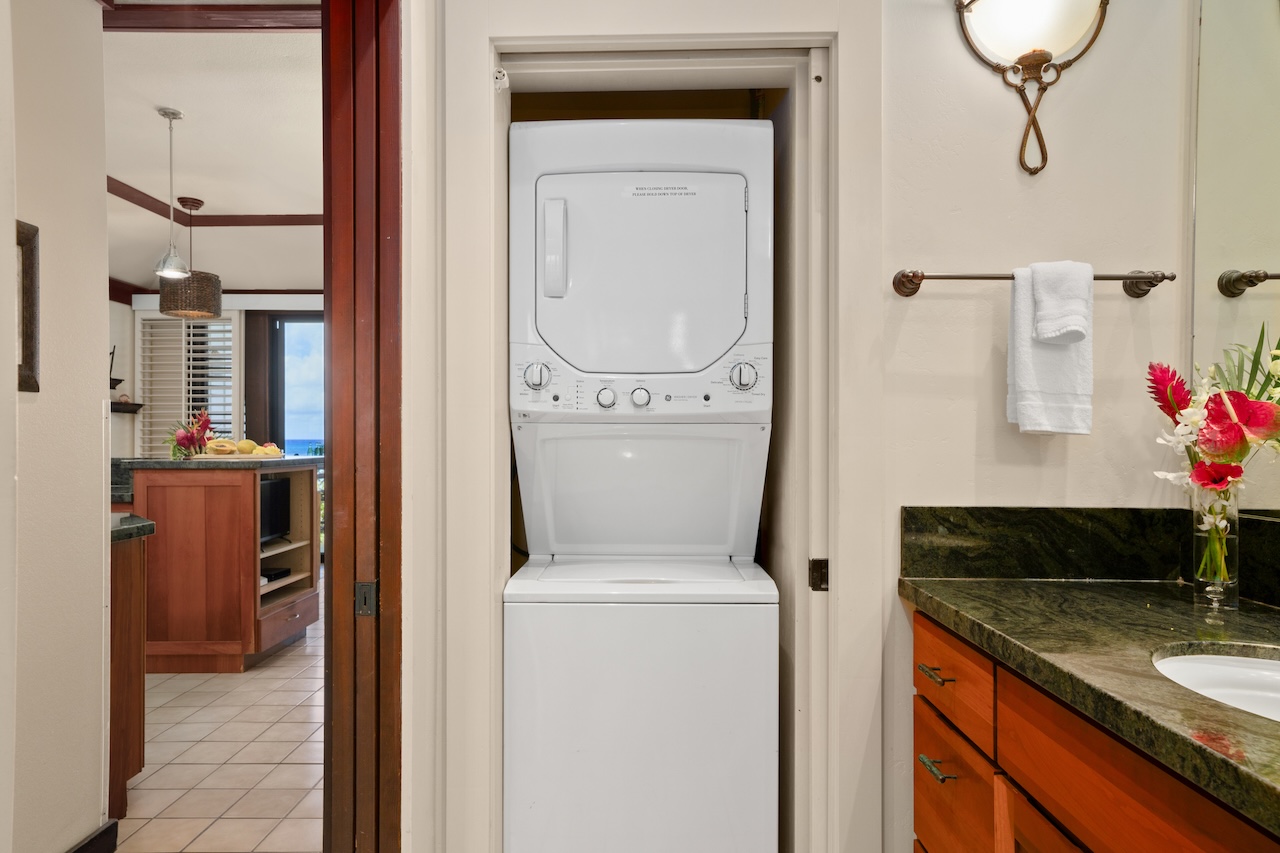 2253 Poipu Road, Unit 192 Koloa, HI 96756 - Photo 22 of 27 a utility room with dryer and washer