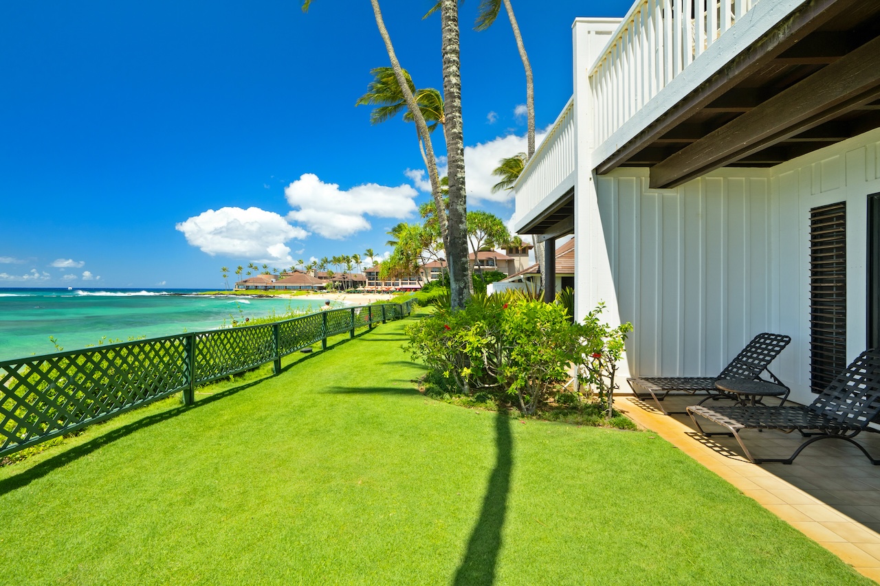 2253 Poipu Road, Unit 192 Koloa, HI 96756 - Photo 24 of 27 a view of a fountain in front of house with a yard