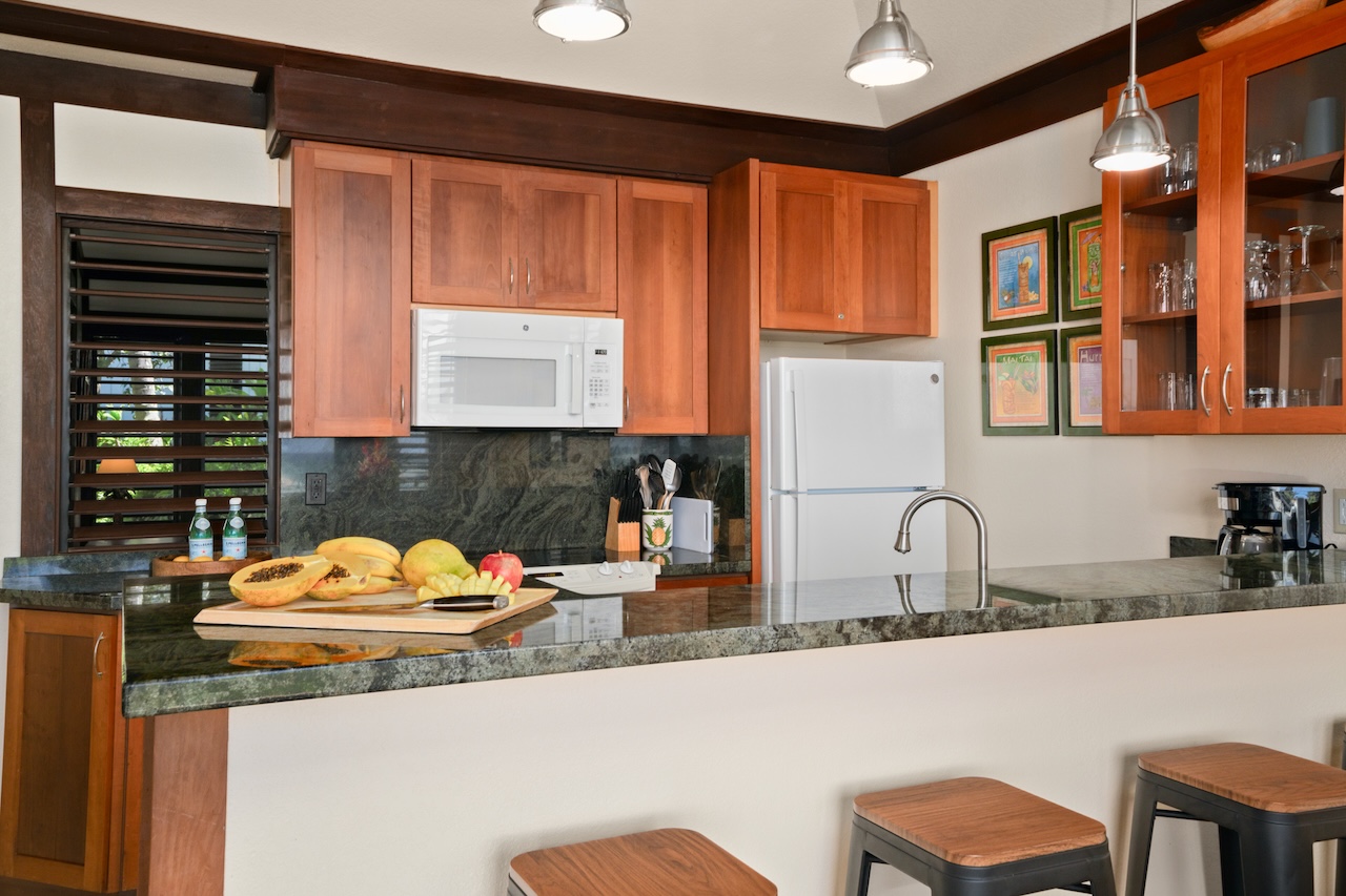 2253 Poipu Road, Unit 192 Koloa, HI 96756 - Photo 8 of 27 a kitchen with a sink and a cabinets