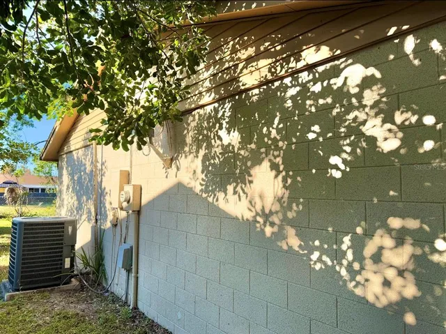 a backyard of a house with lots of tree