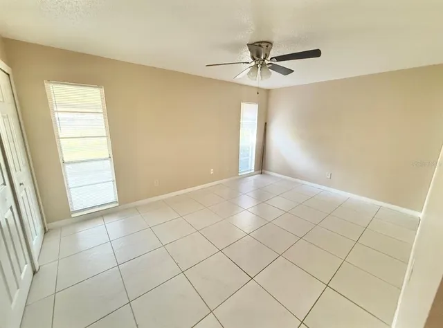 a view of an empty room and window