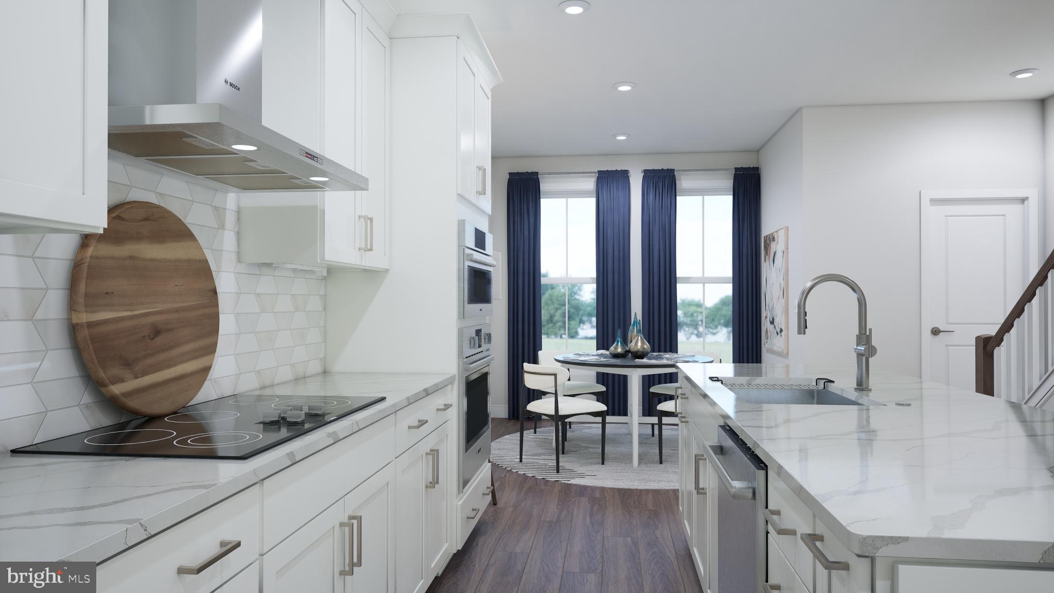 2680 River Birch Road Herndon, VA 20171 - Photo 5 of 30 a kitchen with a sink and a stove top oven