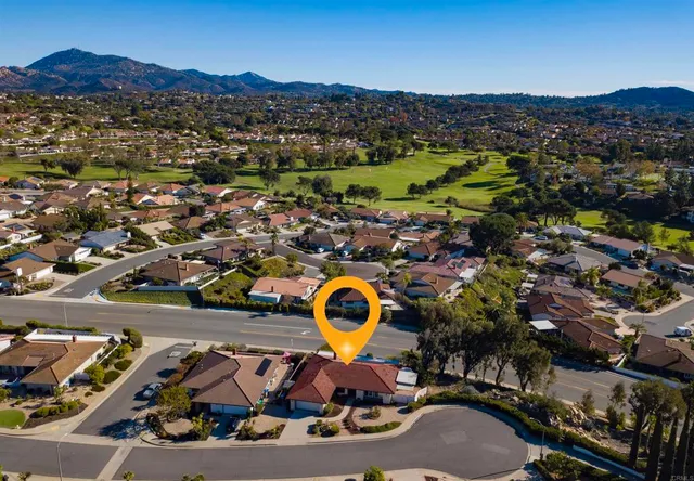 an aerial view of swimming pool and mountain view