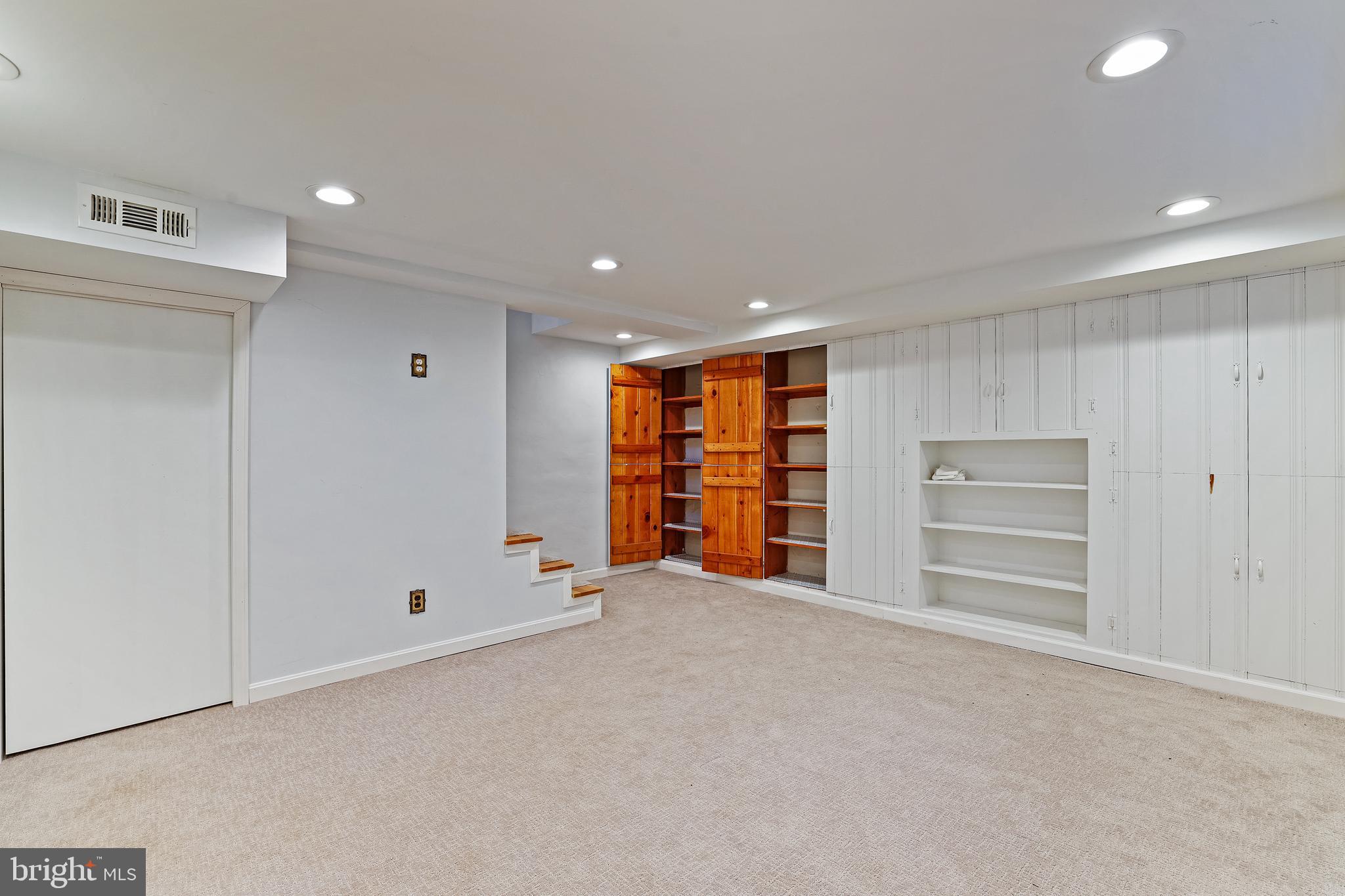 3429 Carpenter Street Southeast Washington, DC 20020 - Photo 21 of 27 a view of an empty room with closet and stairs