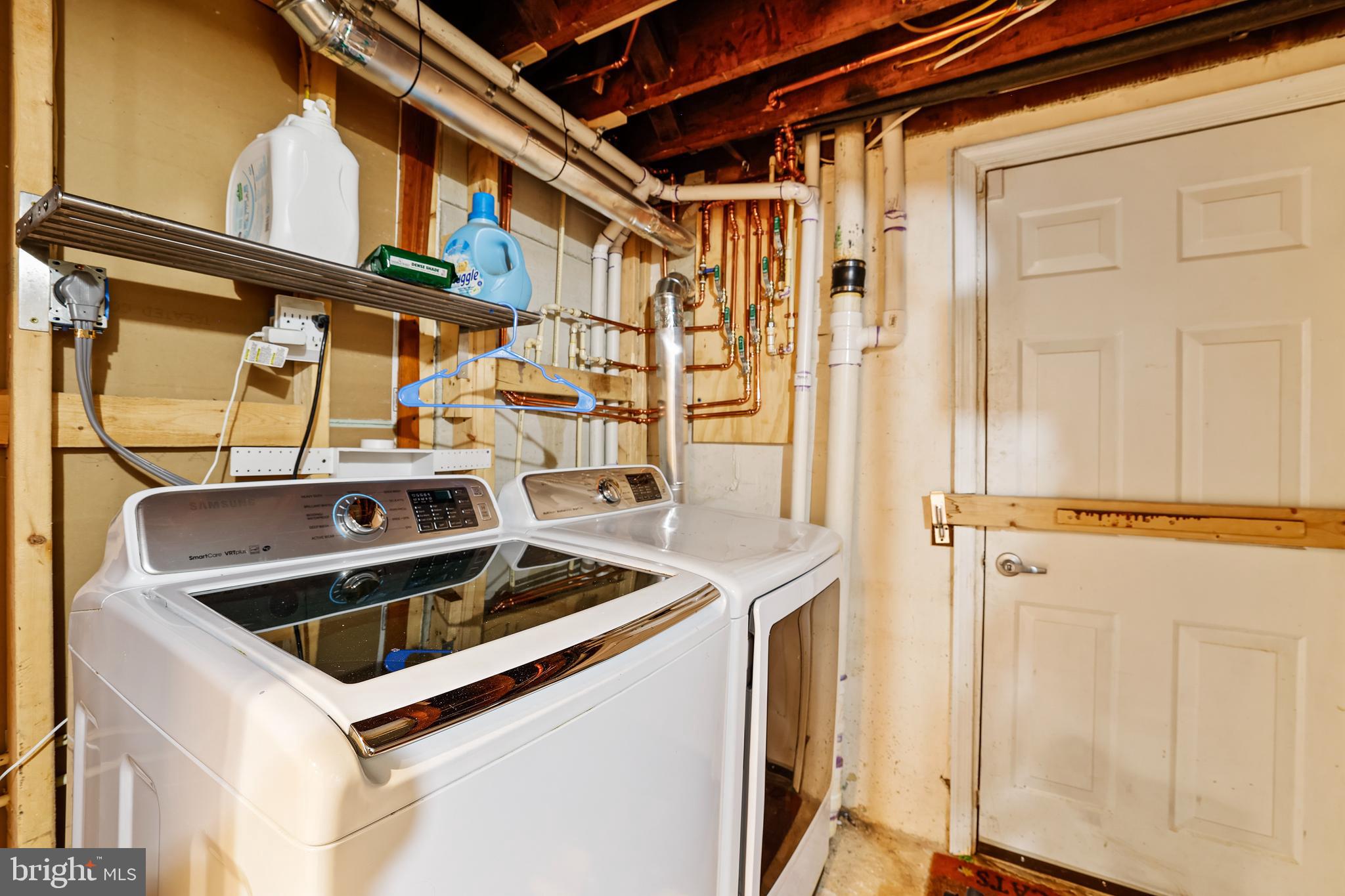 3429 Carpenter Street Southeast Washington, DC 20020 - Photo 22 of 27 a utility room with dryer and washer