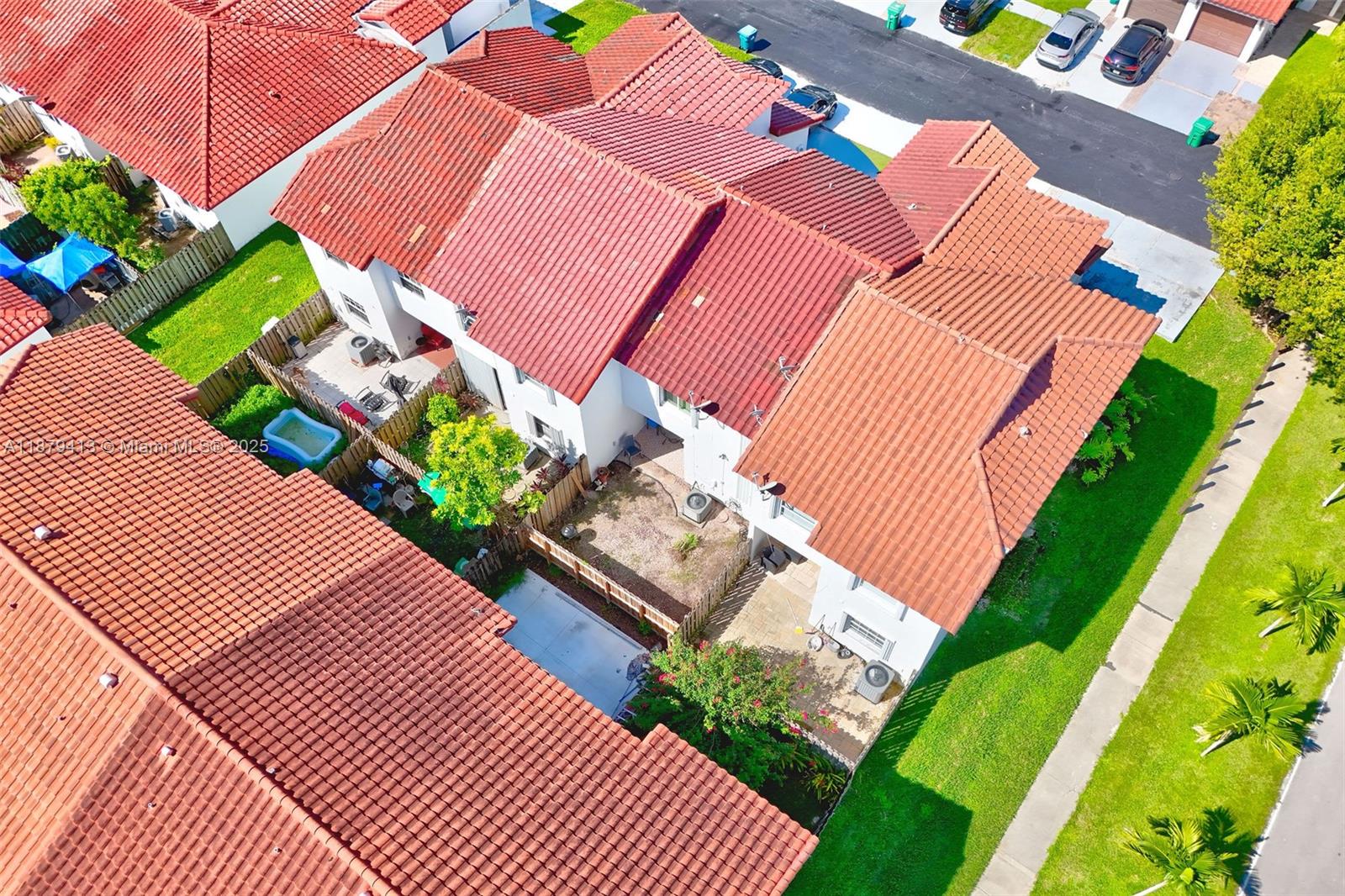 20717 Southwest 81st Place Cutler Bay, FL 33189 - Photo 23 of 23 a view of a backyard with sitting area