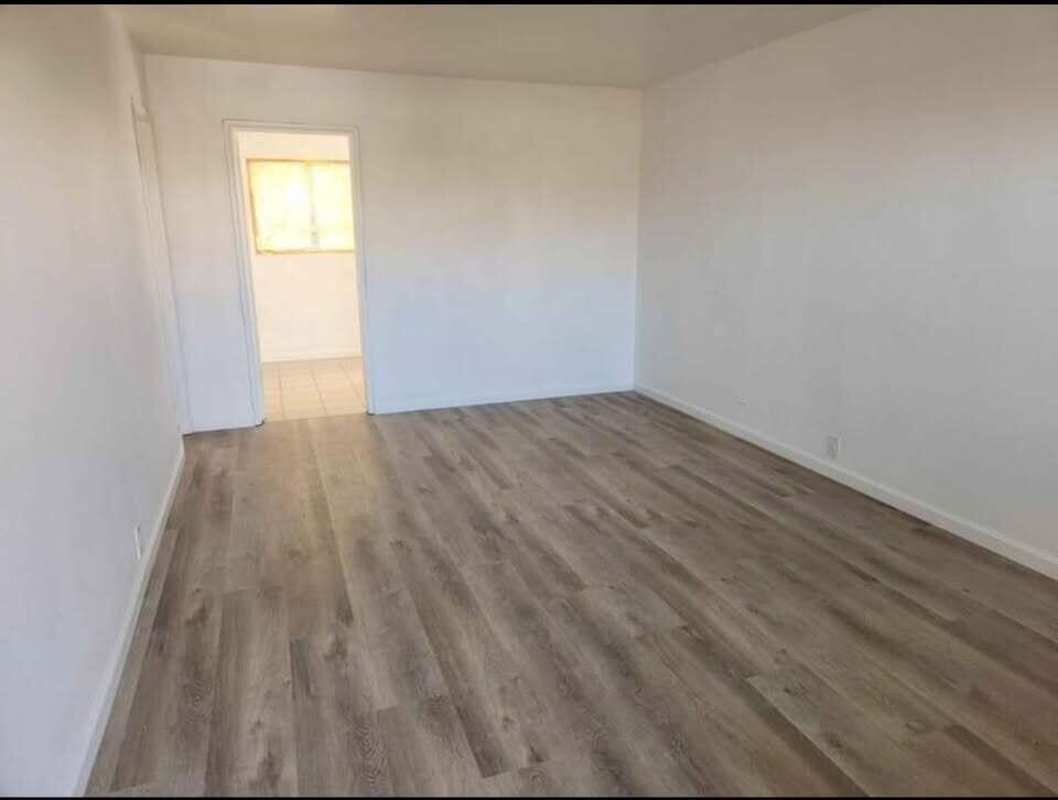 10485 Santa Cruz Road Desert Hot Springs, CA 92240 - Photo 7 of 16 a view of an empty room and window