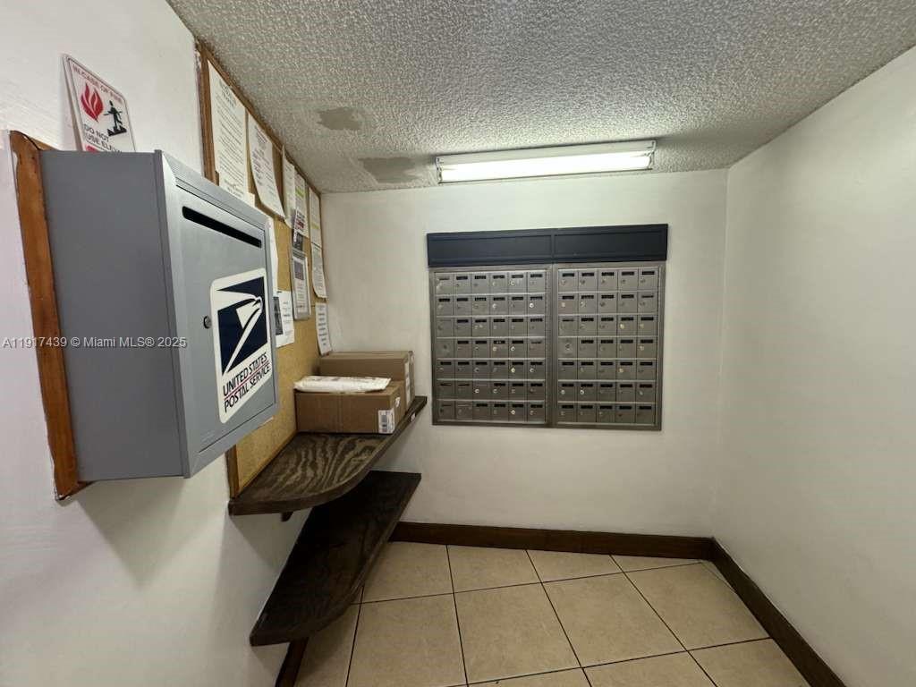 3730 Inverrary Drive, Unit 3U Lauderhill, FL 33319 - Photo 20 of 37 a view of an empty room with a window and wooden floor