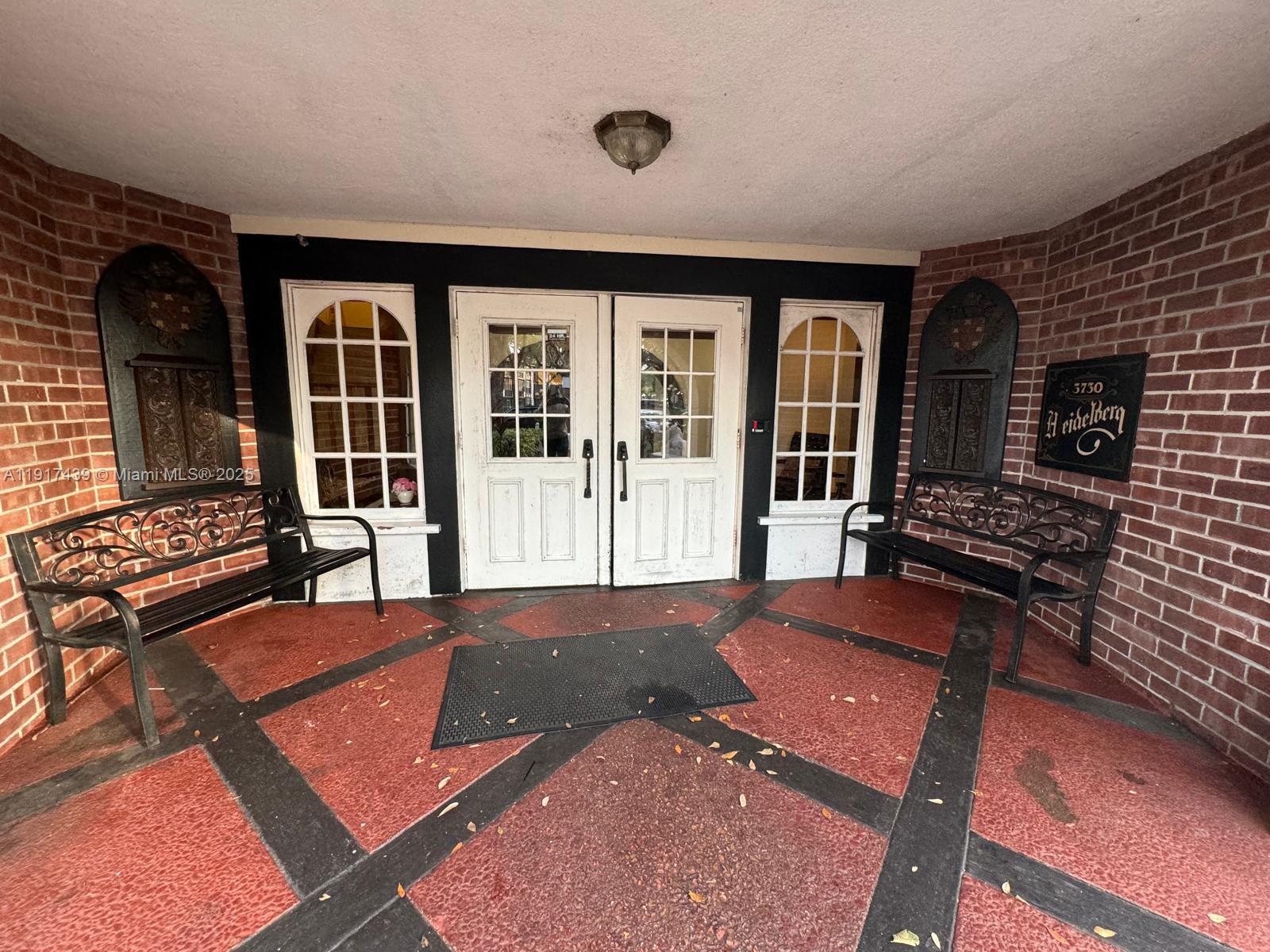 3730 Inverrary Drive, Unit 3U Lauderhill, FL 33319 - Photo 35 of 37 a living room with furniture rug and wooden floor