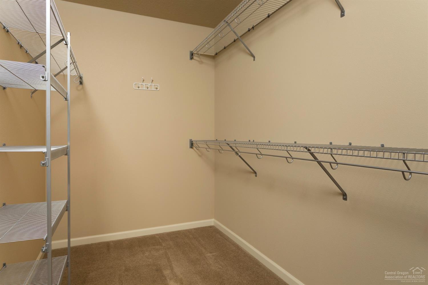 60303 Addie Triplett Loop Bend, OR 97702 - Photo 12 of 21 Master bedroom walk in closet.