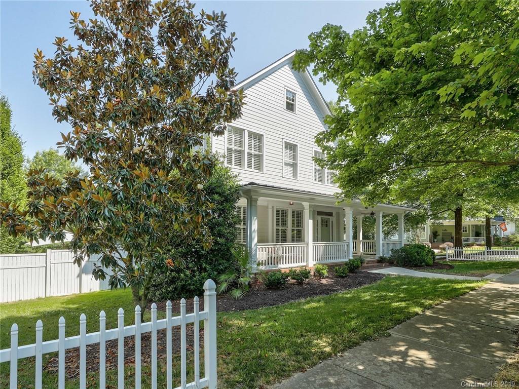 2533 Lower Assembly Drive Fort Mill, SC 29708 - Photo 2 of 48 a front view of a house with a garden