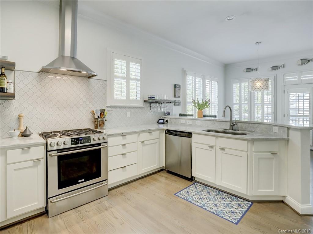 2533 Lower Assembly Drive Fort Mill, SC 29708 - Photo 17 of 48 a kitchen with a stove sink and a window