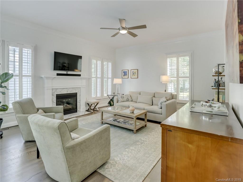 2533 Lower Assembly Drive Fort Mill, SC 29708 - Photo 22 of 48 a living room with furniture fireplace and a flat screen tv