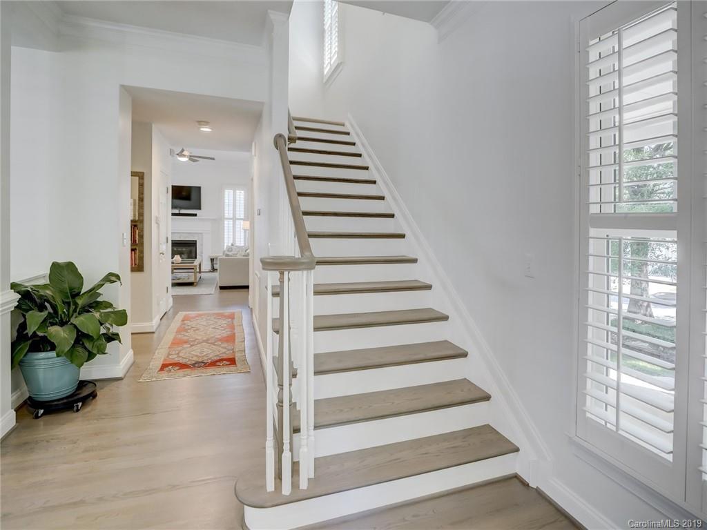 2533 Lower Assembly Drive Fort Mill, SC 29708 - Photo 27 of 48 a view of entryway with wooden floor and stairs