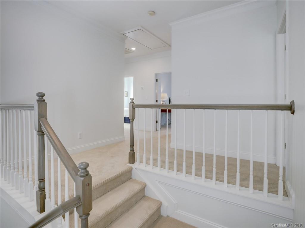 2533 Lower Assembly Drive Fort Mill, SC 29708 - Photo 28 of 48 a view of staircase with white walls and white walls