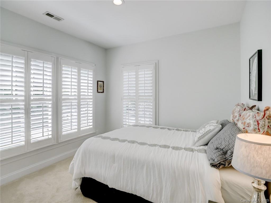 2533 Lower Assembly Drive Fort Mill, SC 29708 - Photo 31 of 48 a bedroom with a bed and a large window