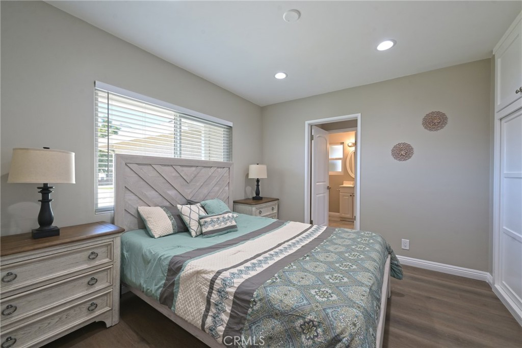 10028 Mildred Court Riverside, CA 92503 - Photo 17 of 50 a bedroom with a bed and a window