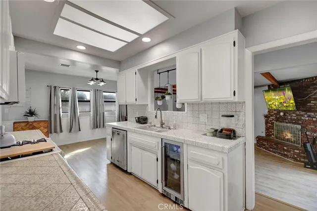 a room with furniture and a flat screen tv