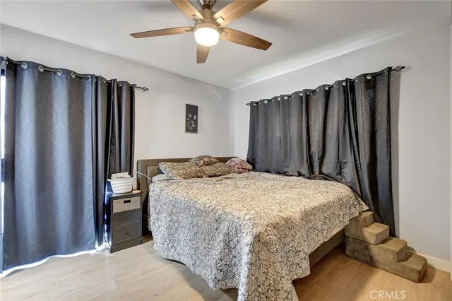 a bed room with a bed and a walk in closet