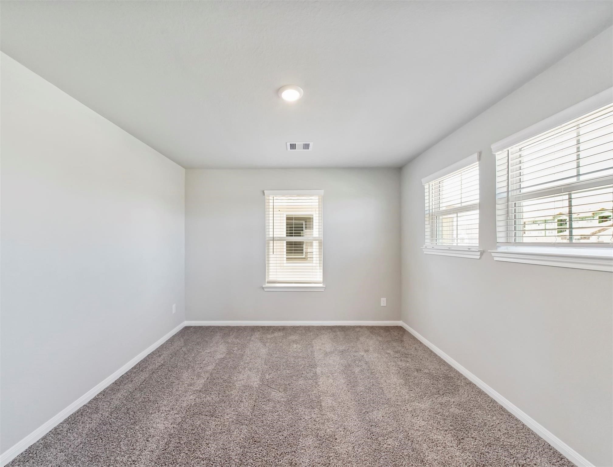 21727 Reserve Ranch Trail Richmond, TX 77407 - Photo 17 of 27 Private flex room with bright windows and neutral finishes—ideal for a home office, study, or creative retreat.