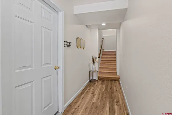 a bedroom with furniture and a fireplace