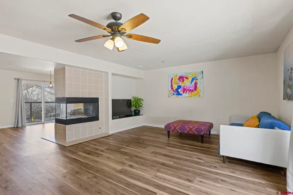 a room with furniture and a large window