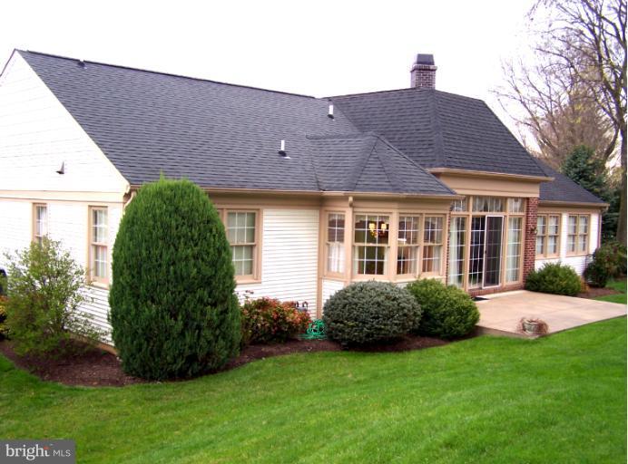 2373 Bear Den Road Frederick, MD 21701 - Photo 10 of 26 a view of a house with backyard and garden