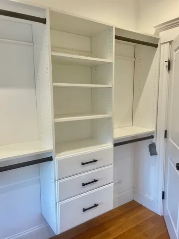 a view of a living room with stairs